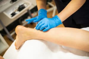 Podiatrist Doing A Dry Needling Therapy