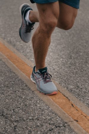 runner wearing custom orthotics in darwin